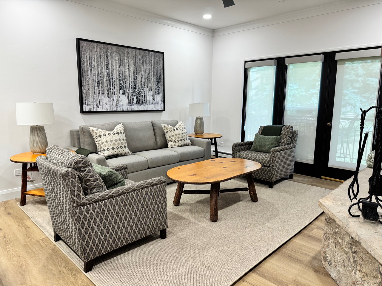 Grey living room flooring installation in rental by Ruggs Benedict